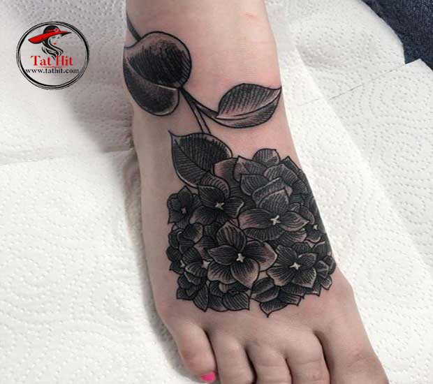 black hydrangea tattoo on foot