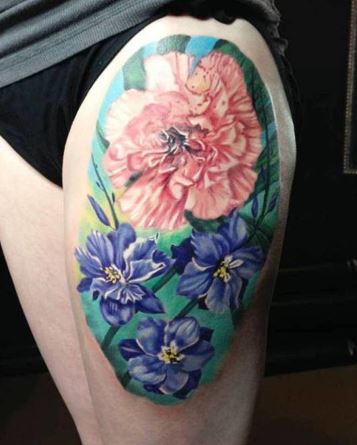 Awesome Larkspur Flowers Tattoo On Thigh