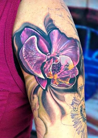 Dark Purple Larkspur Flower Tattoo On Arm