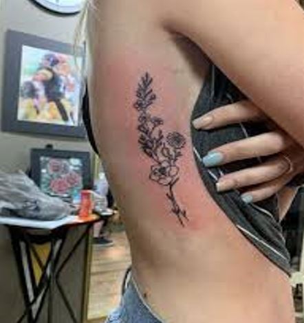 Larkspur Flower Tattoo On Rib